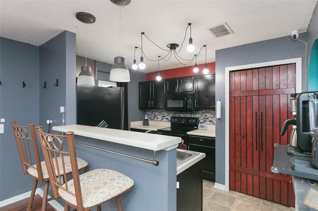 9922 ASHBURN LAKE DRIVE, Tampa, FL 33610