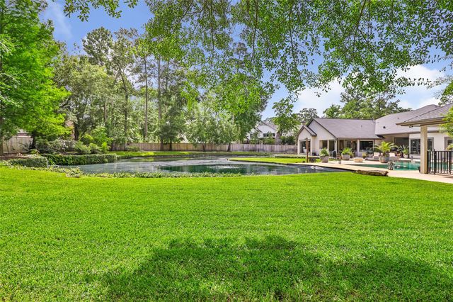 11 Turtle Cove Court, Kingwood, TX 77346
