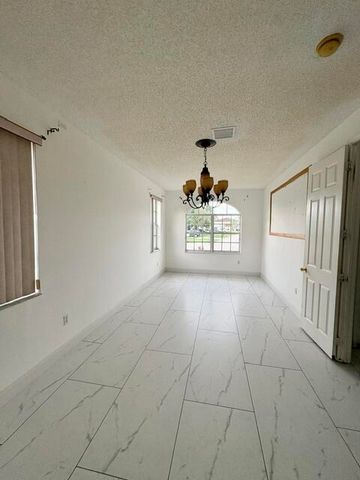 127 Saratoga Boulevard W, Royal Palm Beach, FL 33411