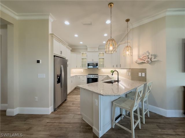 6399 NEGRIL ISLE DR, Naples, FL 34113