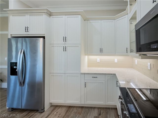 6399 NEGRIL ISLE DR, Naples, FL 34113