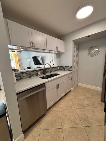 123 Yacht Club Way 207, Hypoluxo, FL 33462