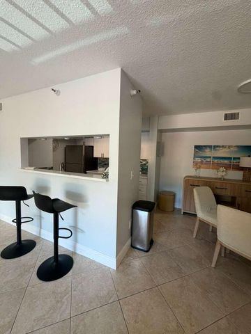 123 Yacht Club Way 207, Hypoluxo, FL 33462