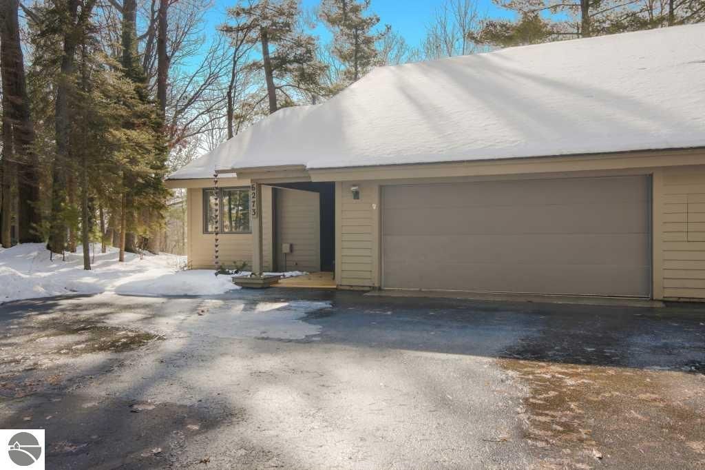 Image 2 of property listing at 6273 Summit Court, Traverse City, MI 49686