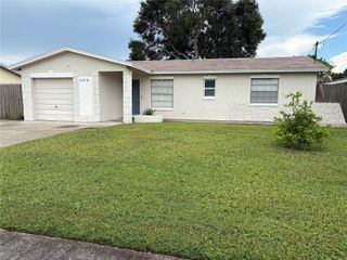 6418 W PARIS STREET, Tampa, FL 33634