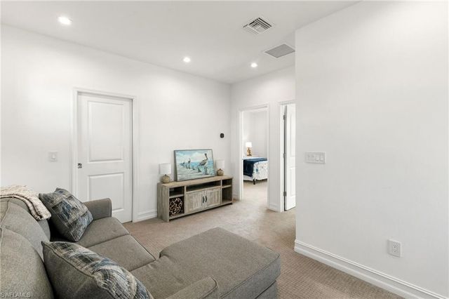 7437 Rockefeller DR, Naples, FL 34119