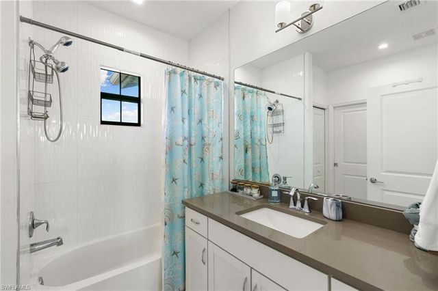 7437 Rockefeller DR, Naples, FL 34119