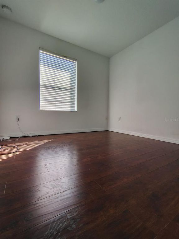 Image 8 of property listing at 9871 TRUMPET VINE LOOP, Trinity, FL 34655