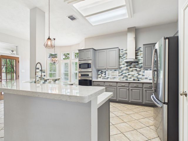 2906 Sycamore Tree Court, Houston, TX 77345