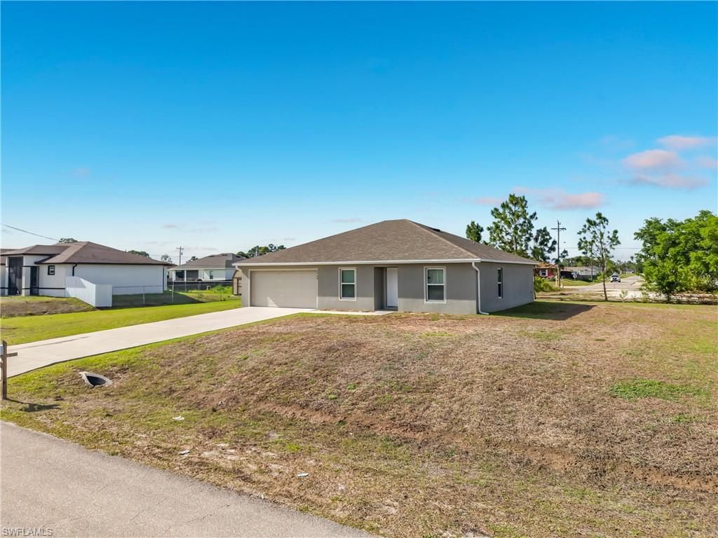 2908 24th ST SW, LEHIGH ACRES, FL 33976 — exterior