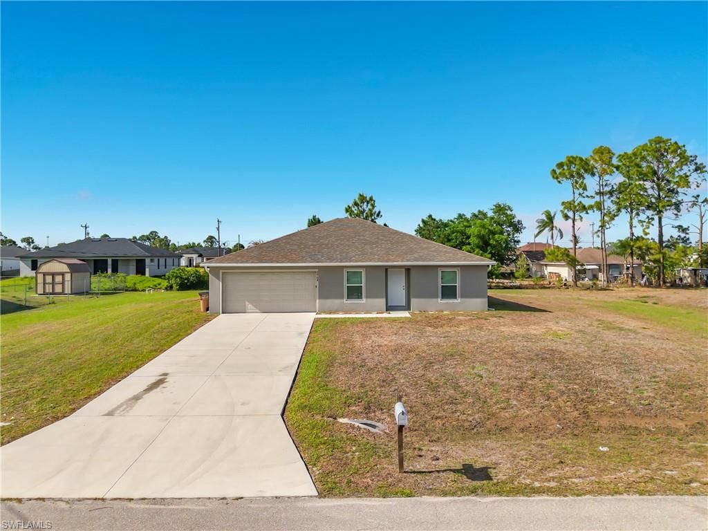 2908 24th ST SW, LEHIGH ACRES, FL 33976 — photo 2