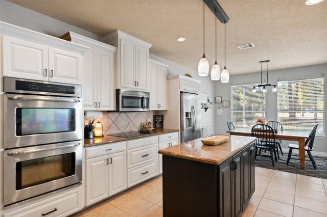 26722 Winding River Trail, Huffman, TX 77336