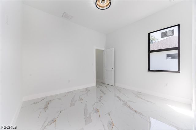 1223 Milwaukee BLVD N, Lehigh Acres, FL 33974