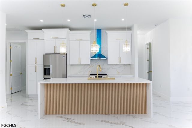 1223 Milwaukee BLVD N, Lehigh Acres, FL 33974