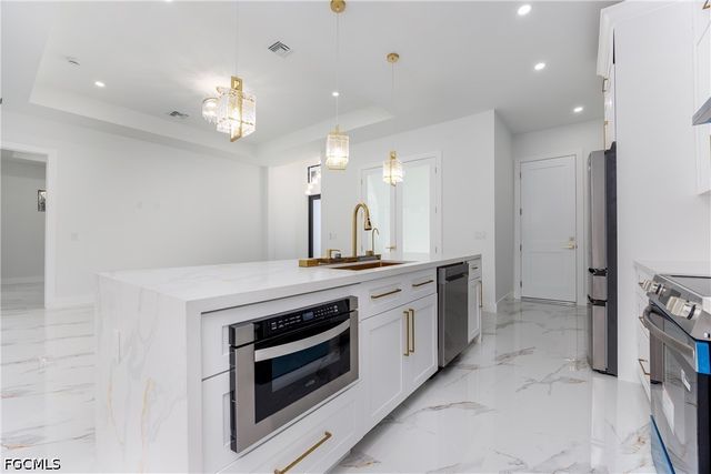 1223 Milwaukee BLVD N, Lehigh Acres, FL 33974