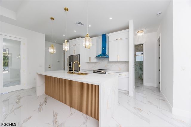 1223 Milwaukee BLVD N, Lehigh Acres, FL 33974