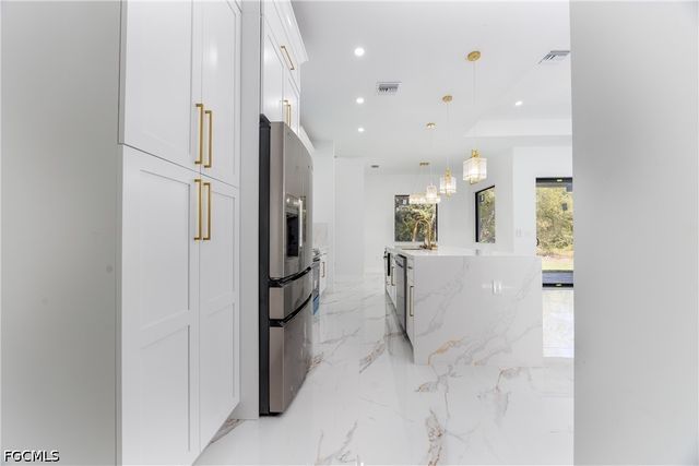 1223 Milwaukee BLVD N, Lehigh Acres, FL 33974