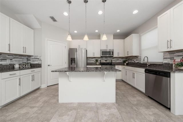 9769 WINNINGTON STREET, Orlando, FL 32832