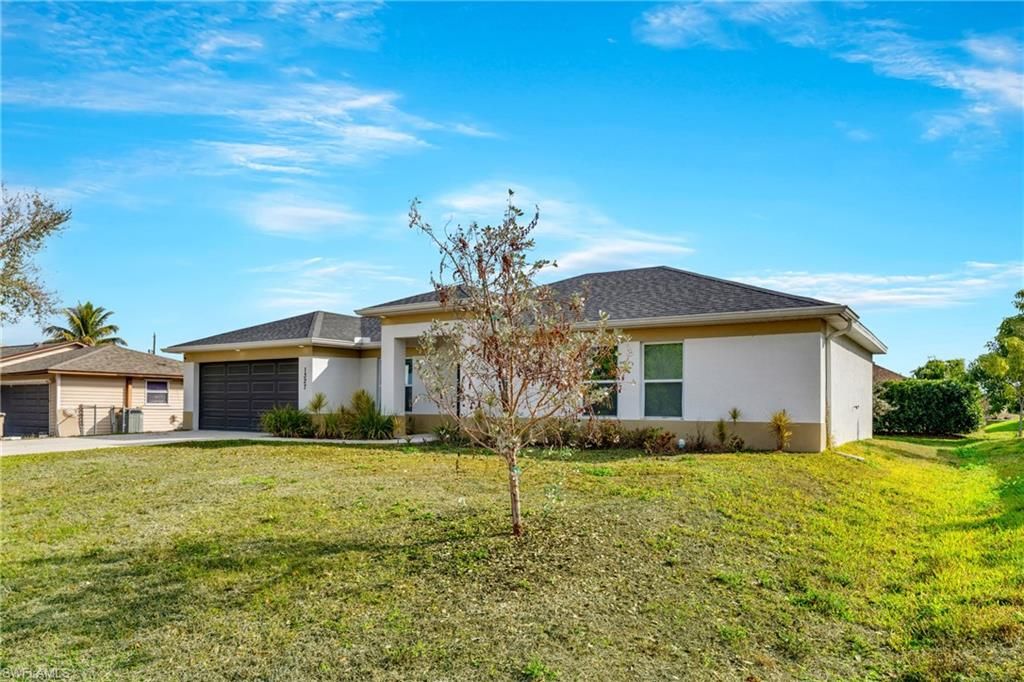 1327 NE 12th AVE, CAPE CORAL, FL 33909 — photo 2