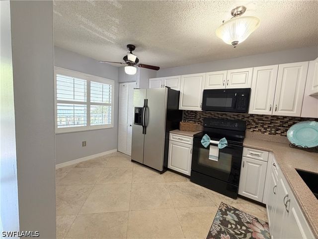 5685 Whitaker RD 202, Naples, FL 34112