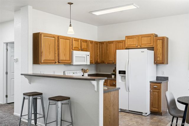 11624 W 62nd Place 102, Arvada, CO 80004