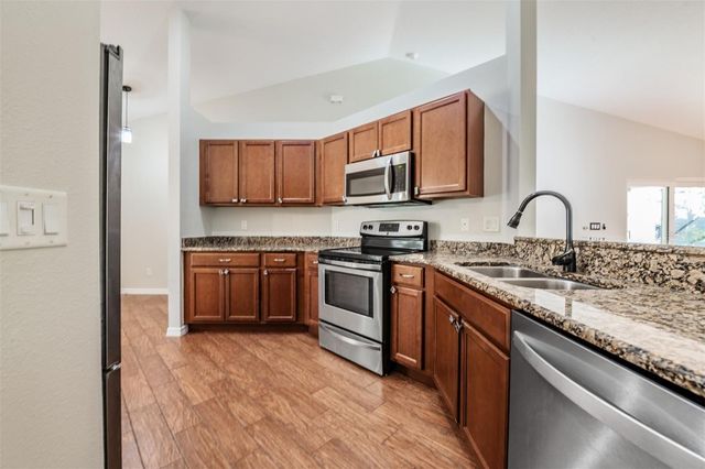 1571 SUNSET POINT ROAD, Clearwater, FL 33755