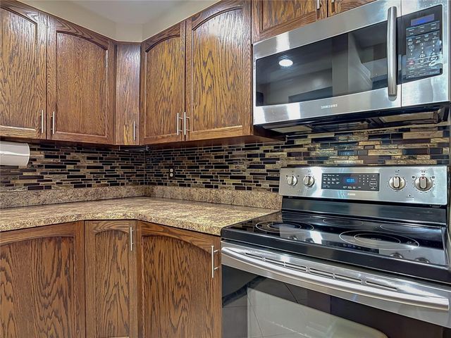 150 WAX MYRTLE WOODS COURT 8C, Deltona, FL 32725