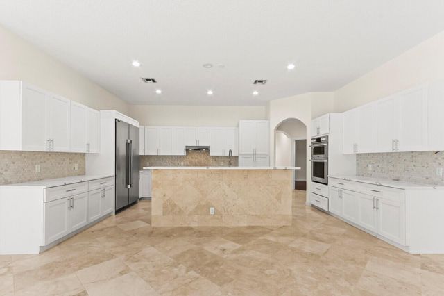 8280 Woodsmuir Drive, Palm Beach Gardens, FL 33412
