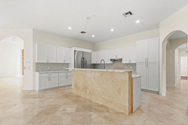 8280 Woodsmuir Drive, Palm Beach Gardens, FL 33412