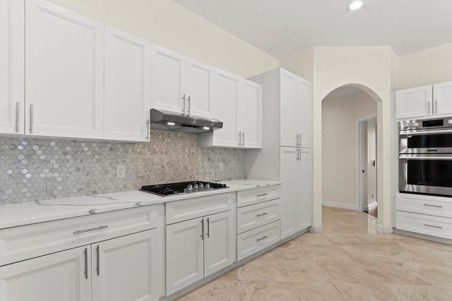 8280 Woodsmuir Drive, Palm Beach Gardens, FL 33412