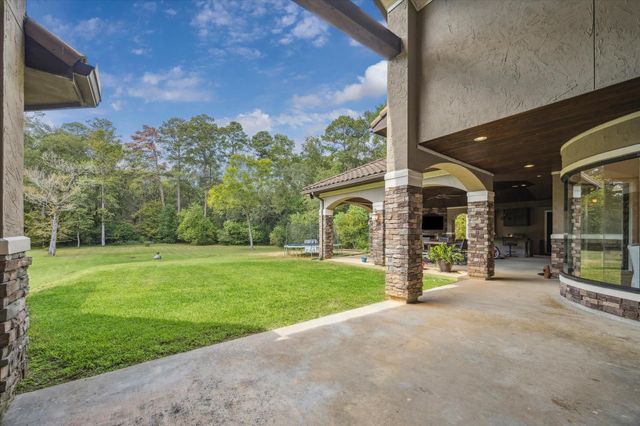 7373 Teaswood Drive, Conroe, TX 77304