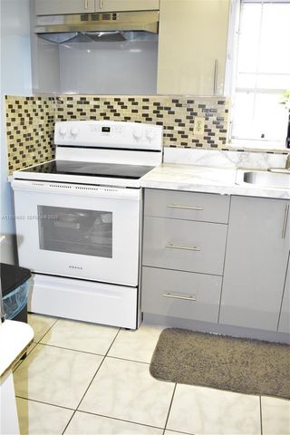 9141 Sunrise Lakes Boulevard 201, Sunrise, FL 33322