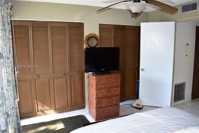 9141 Sunrise Lakes Boulevard 201, Sunrise, FL 33322