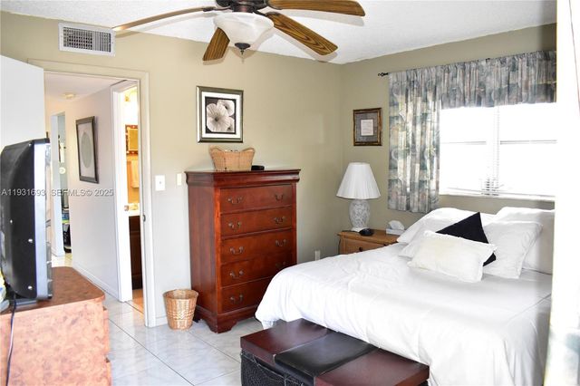 9141 Sunrise Lakes Boulevard 201, Sunrise, FL 33322