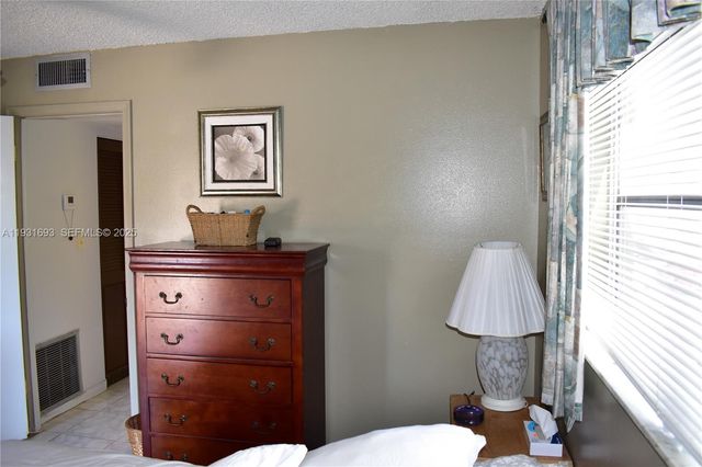 9141 Sunrise Lakes Boulevard 201, Sunrise, FL 33322