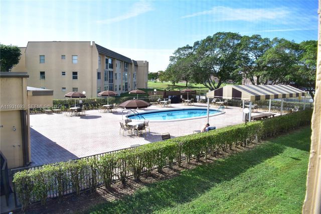 9141 Sunrise Lakes Boulevard 201, Sunrise, FL 33322