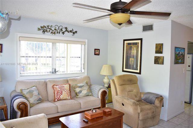 9141 Sunrise Lakes Boulevard 201, Sunrise, FL 33322
