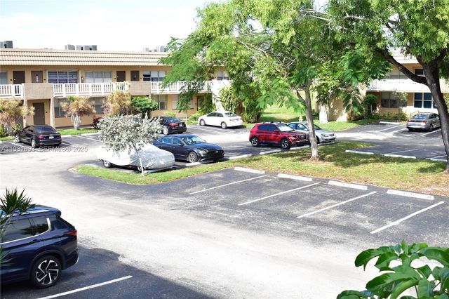 9141 Sunrise Lakes Boulevard 201, Sunrise, FL 33322