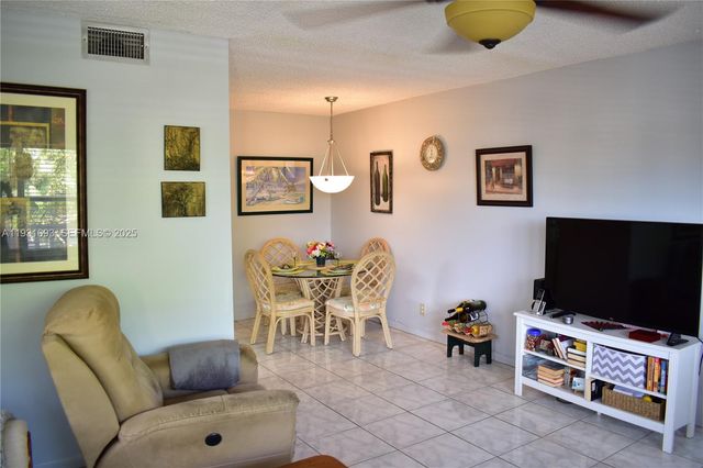 9141 Sunrise Lakes Boulevard 201, Sunrise, FL 33322