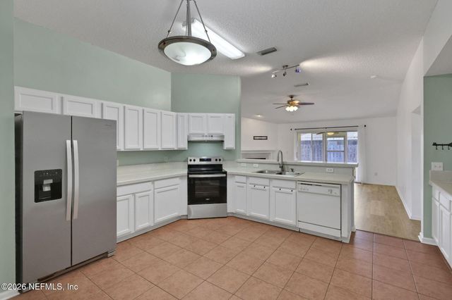 7418 PLANTATION CLUB Drive, Jacksonville, FL 32244