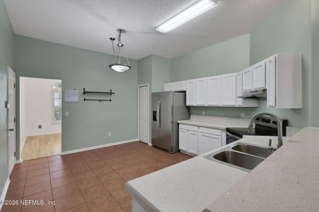 7418 PLANTATION CLUB Drive, Jacksonville, FL 32244