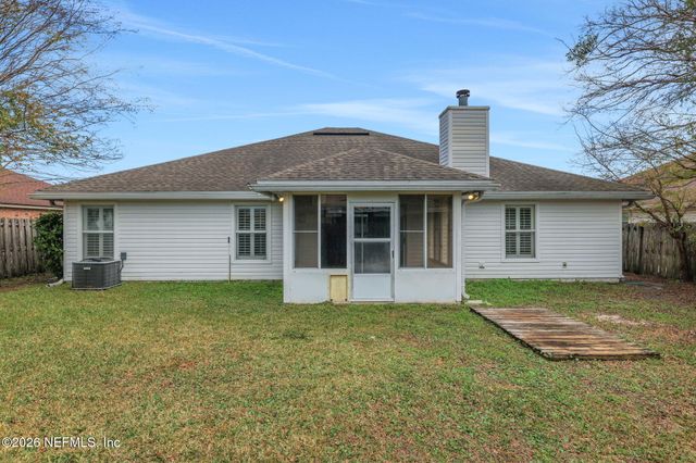 7418 PLANTATION CLUB Drive, Jacksonville, FL 32244