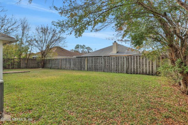 7418 PLANTATION CLUB Drive, Jacksonville, FL 32244