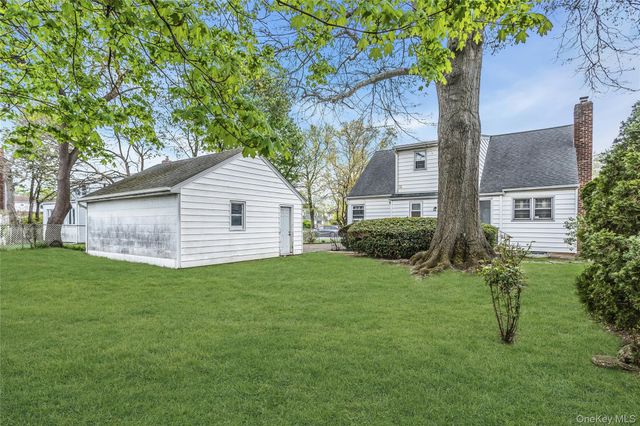 46 Rhodes Drive, New Hyde Park, NY 11040