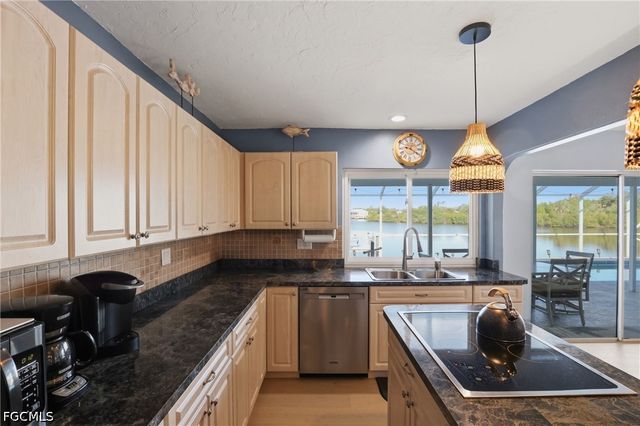 414 Spring Lake BLVD NW, Port Charlotte, FL 33952