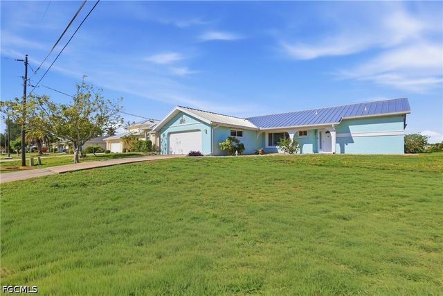 414 Spring Lake BLVD NW, Port Charlotte, FL 33952