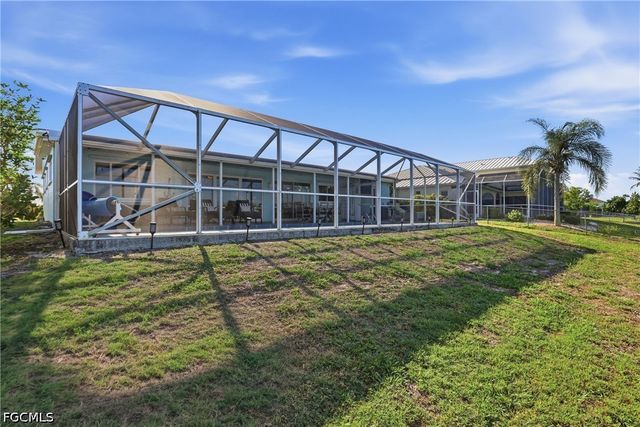 414 Spring Lake BLVD NW, Port Charlotte, FL 33952