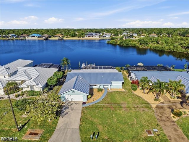 414 Spring Lake BLVD NW, Port Charlotte, FL 33952