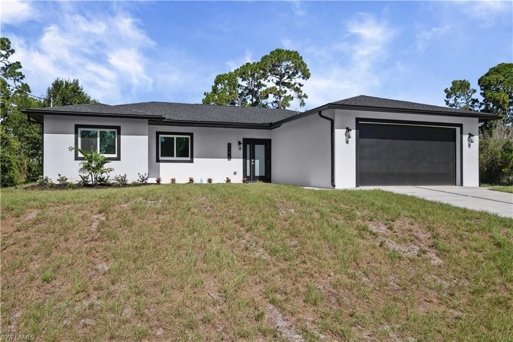 828 Genoa AVE S, LEHIGH ACRES, FL 33974 — photo 2