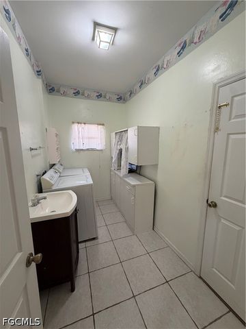 721 Milwaukee BLVD, Lehigh Acres, FL 33974